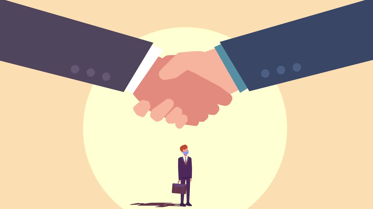 Businessman in face mask looking at big handshake