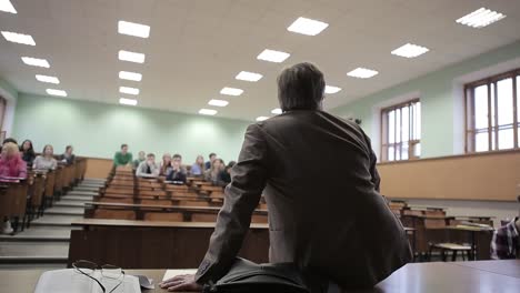 teacher lecturing in a classroom