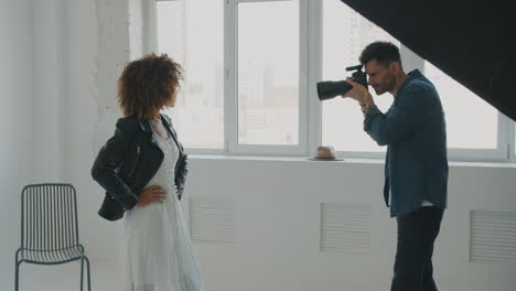 fashion photoshoot in studio with model and photographer