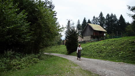 Romanian-girl-visiting-Vila-Klauss,-Romania-2