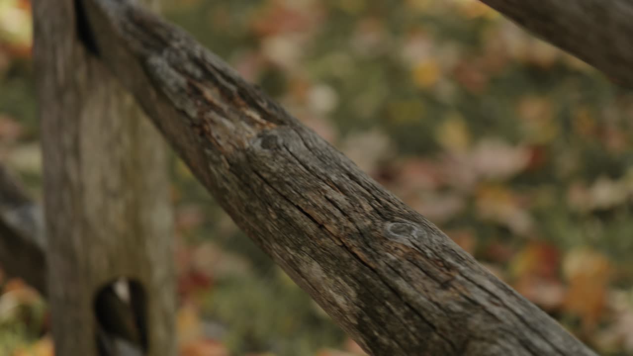 Close up of a rustic wooden fence in the backyard of a farm house in Gatineau, Quebec in Autumn