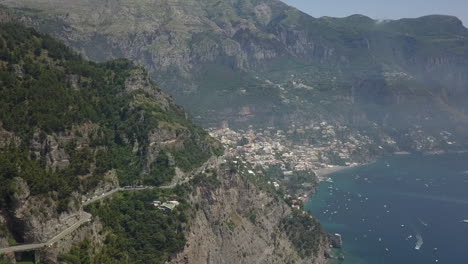 vehicle traffic on scenic amalfi coast road nears