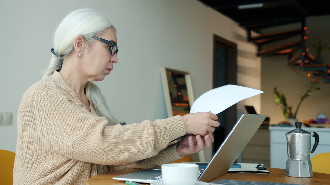Senior Woman Working at Home
