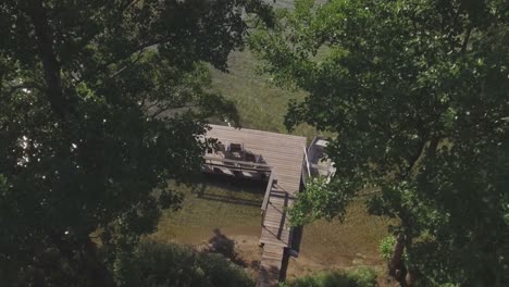 wooden pier and boat on the lake shore-1