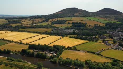 aerial footage of idyllic rolling hills and farming fields in the scottish borders