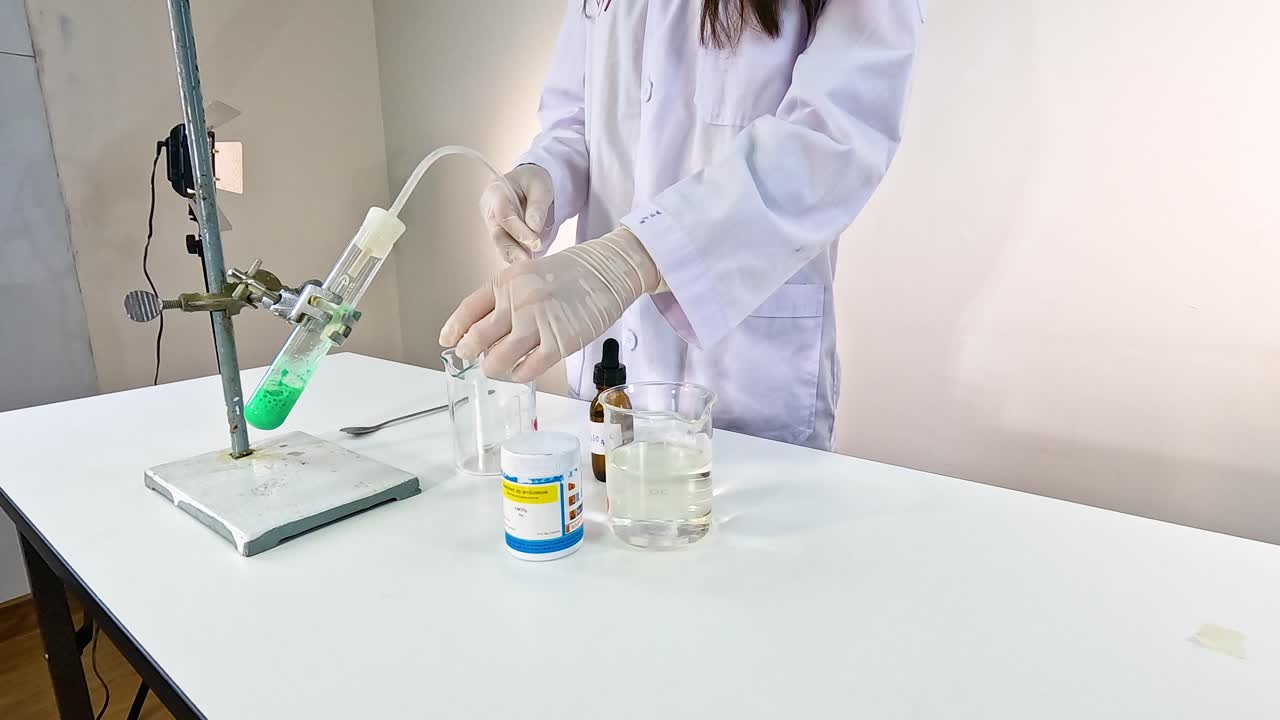 Scientist conducts a chemical reaction between copper carbonate and sulfuric acid in a lab setting with controlled lighting