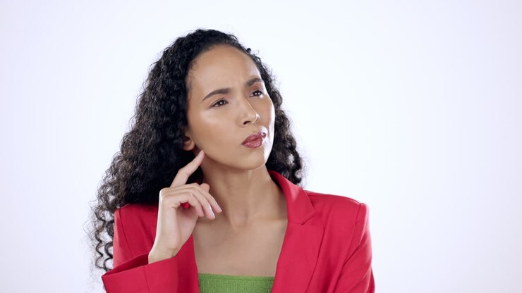 Thinking, confused and woman in studio