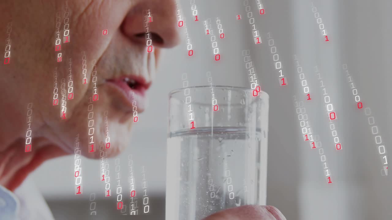 Senior man lifting glass, sipping water for health as binary digits overlaying glass and mouth