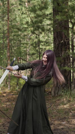 young women laugh and play historical games with swords in forest, exercise fight