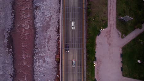 highway covered by mesh of santiago city with mapocho river on the left and the park on the right