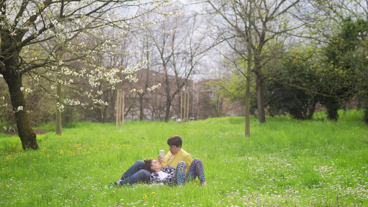 Couple Relaxing in a Spring Park
