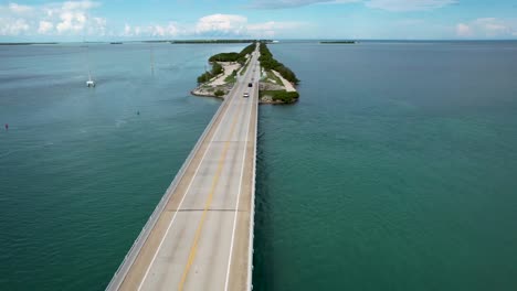 cars driving over bridge to small island in florida keys