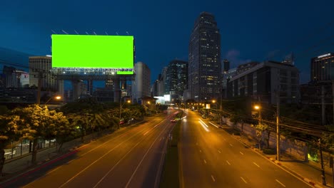 time-lapse of traffic in bangkok buildings in the business area and car trails