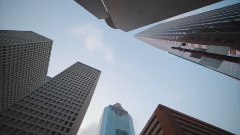 Time-lapse-of-cloudy-sky-over-skyscrapers-in-downtown-Houston,-Texas