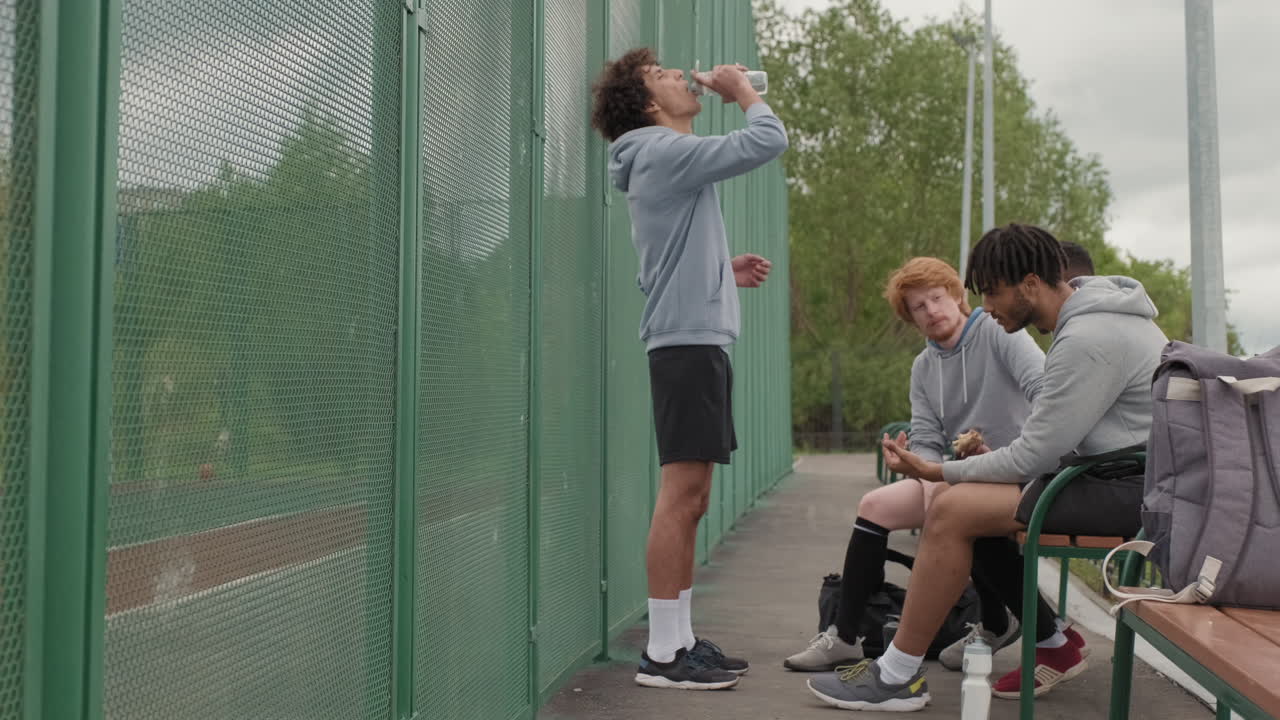 Teenage athletes taking a break