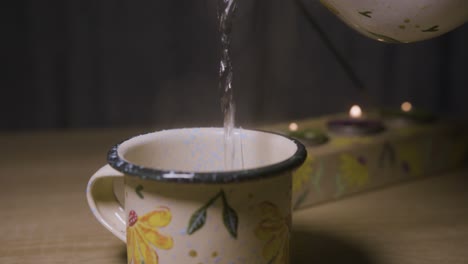 pouring hot water for tea