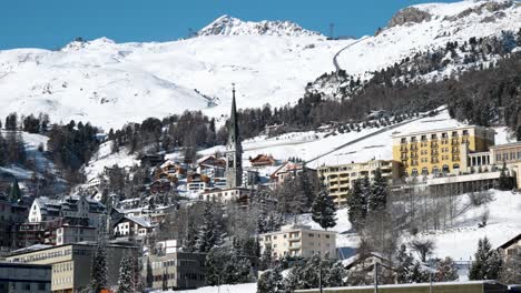 detail view of the town and church covered in snow on a winter sunny day in st