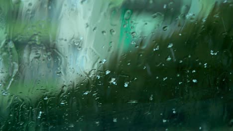rain falling on glass window