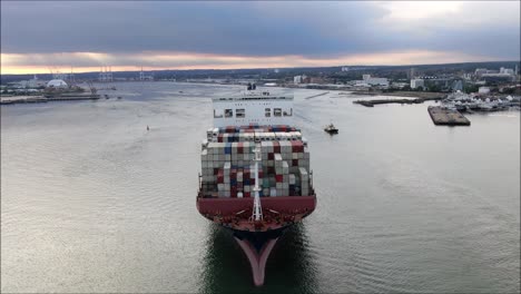 various dolly zoom shots of a container ship leaving port