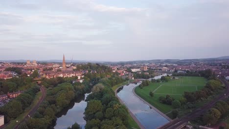 An-aerial-shot-of-the-rivers-running-through-Exeter-at-sunset