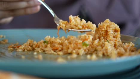 eating fried rice