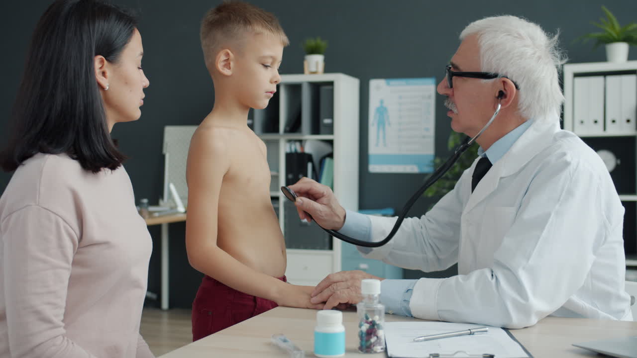 Doctor examining a child patient