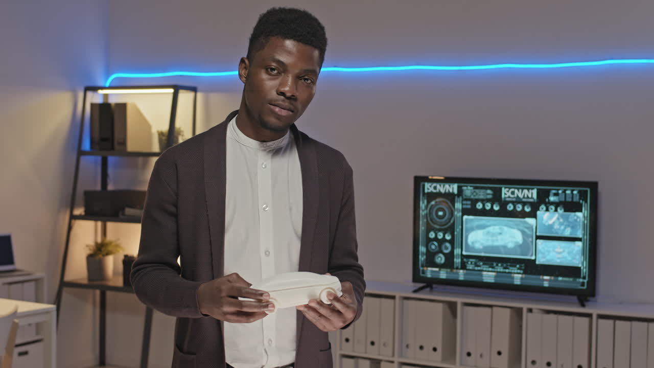 African-American Engineer Posing with Car Model