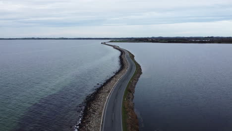 country road by the water in denmark