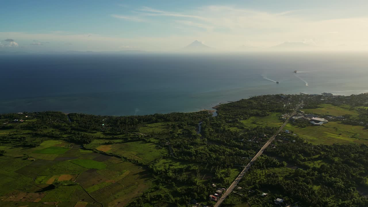 Coastal Agricultural Land Overlooking The Philippine Sea Near Timbaan, San Andres, Catanduanes, Philippines. Aerial Drone Shot