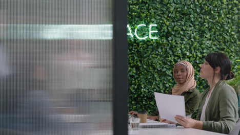 happy-business-people-meeting-in-boardroom-team-leader-woman-presenting-project-on-tablet-computer-colleagues-celebrating-successful-corporate-victory-enjoying-teamwork-high-five-in-presentation