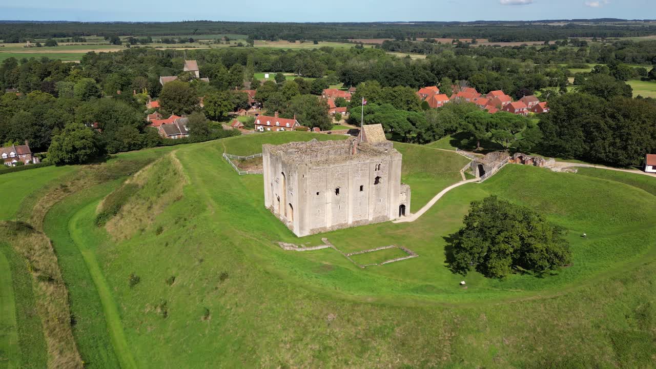 Aerial approach and flyover of Castle Rising, Norfolk, UK
