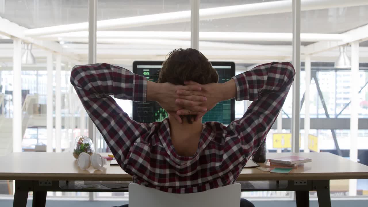 Young man working in a creative office