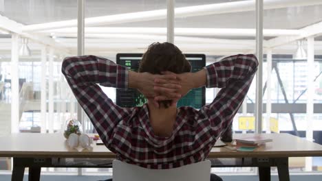 young man working in a creative office