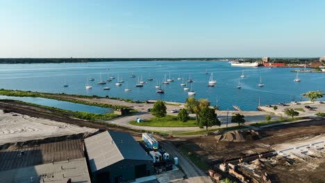 High-level-aerial-of-various-boats-enjoying-the-summer-evening