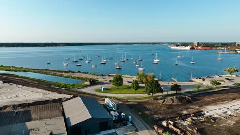 high level aerial of various boats enjoying the summer evening