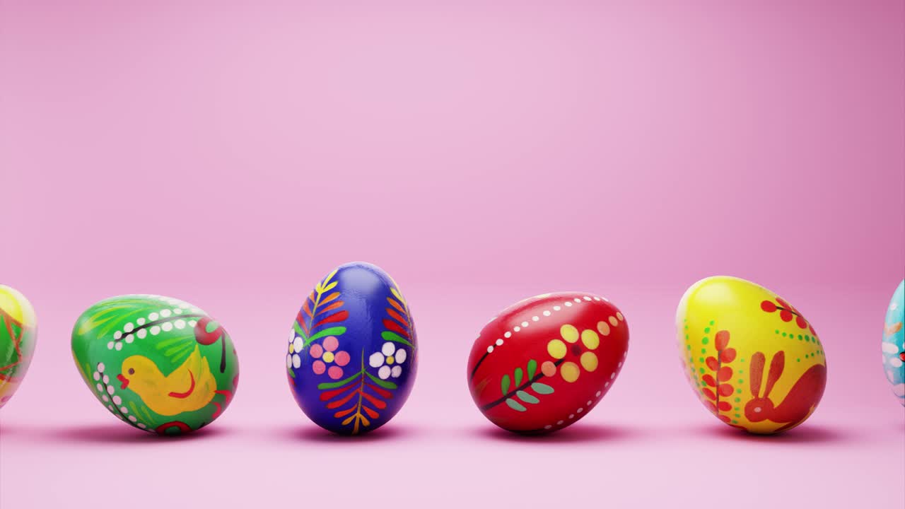 Colorful Painted Easter Eggs Rolling on a Pink Background