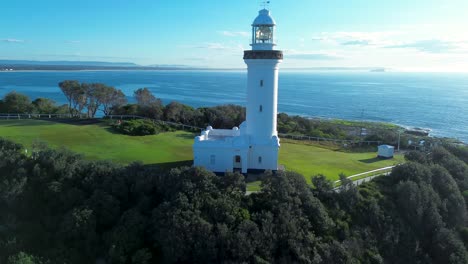 norah head lighthouse beacon tower landscape drone aerial view bushland headland coastline pacific ocean toukley central coast australia travel tourism