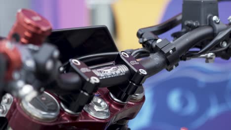 close-up of motorcycle handlebars and components