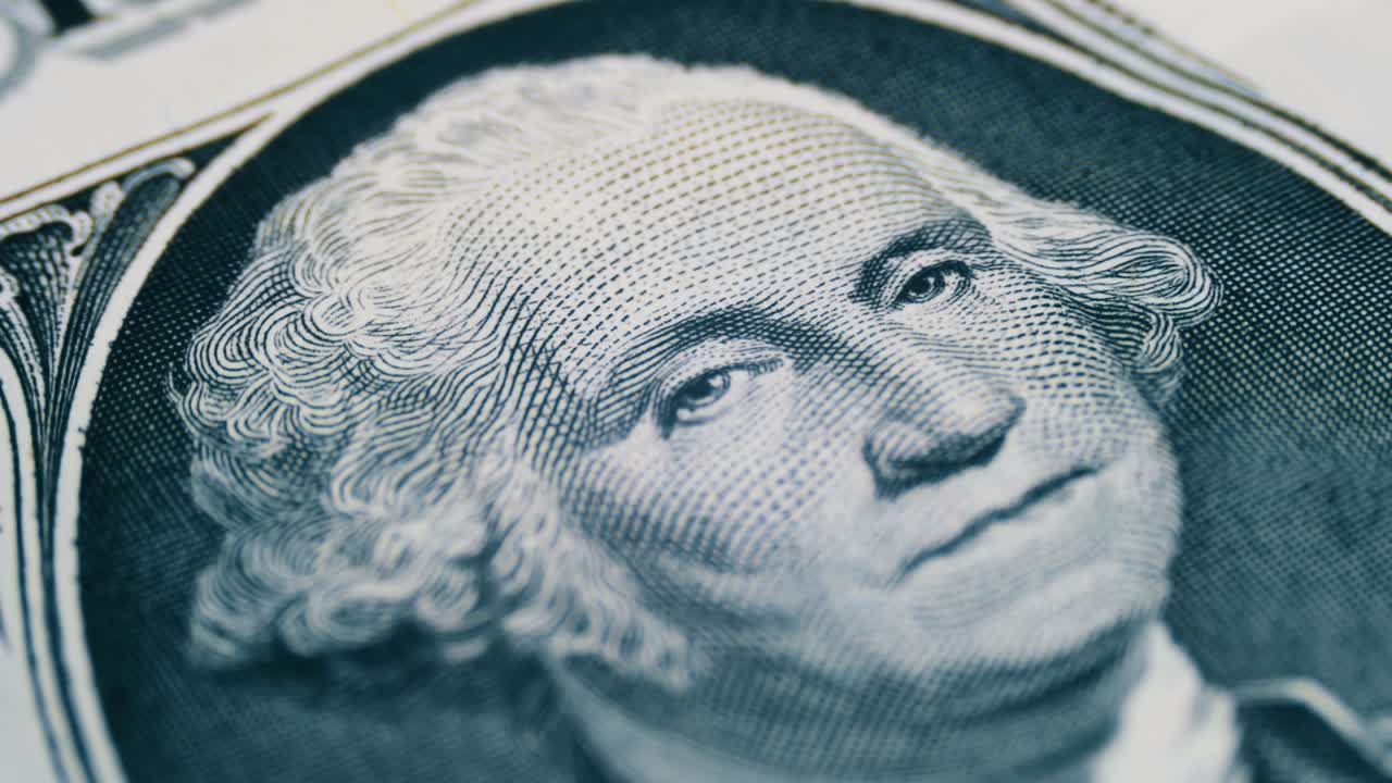 el retrato de george washington girando lentamente en un billete de un dólar