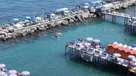 people enjoying the beach and sea