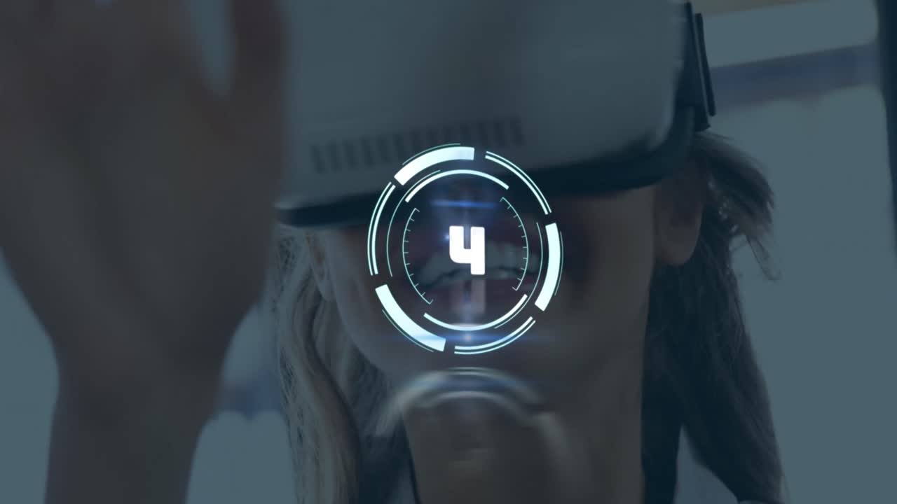 Animation of countdown over smiling caucasian businesswoman using virtual reality headset at office