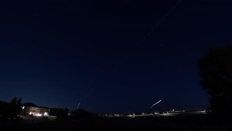 jet light trails time lapse in busy air traffic corridor over central utah