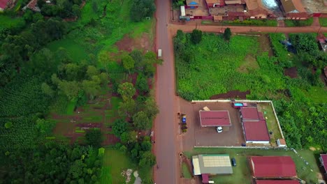 long country road to jinja town in southern uganda, east africa