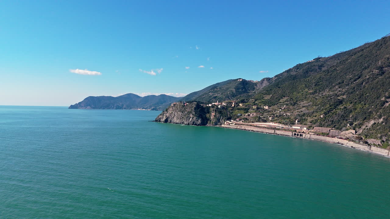 Corniglia in cinque terre, italy, showcasing coastline and mountains, aerial view