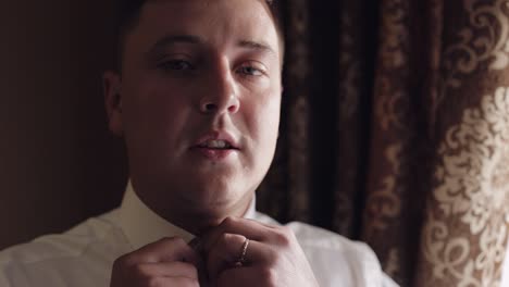 groom getting ready for his wedding