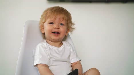 child with white hair and blue eyes