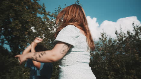 women playing outdoors