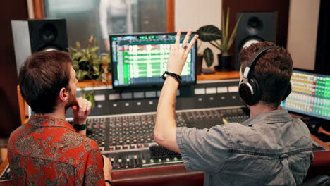 people working in a music studio