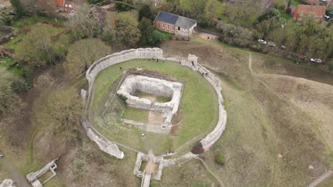 aerial approach drone view of bailey gate at castle acre, norfolk, england