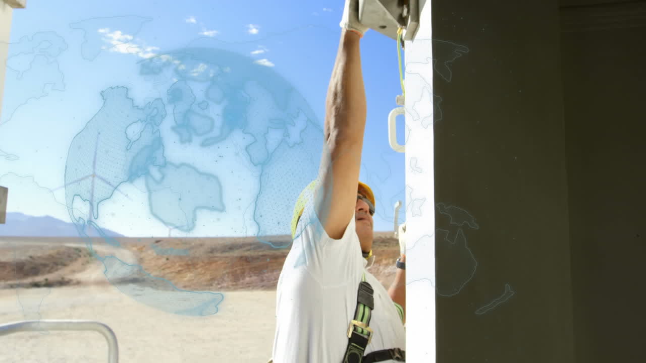 시골에 있는 엔지니어와 풍력 터빈 위의 지구의 애니메이션